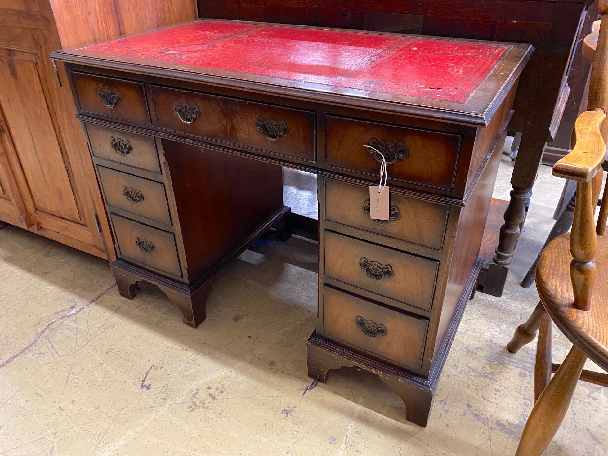 A reproduction mahogany pedestal desk, width 100cm, depth 56cm, height 76cm